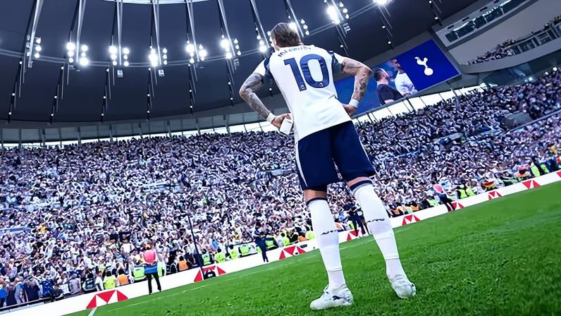 James Maddison with Tottenham fans after their final-day win against Everton.