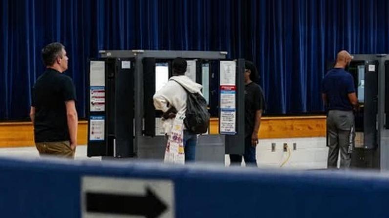 Voters cast their ballots at a polling place on election day in East Point, Georgia, on 5 November 2024.