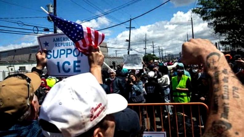 Supporters and opponents of ICE shout at each other outside Delaney Hall in Newark, New Jersey, on 30 May 2026.