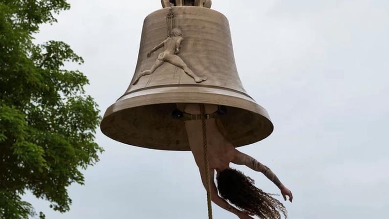 Rising from the waves … the artist as a bell clapper in Venice.