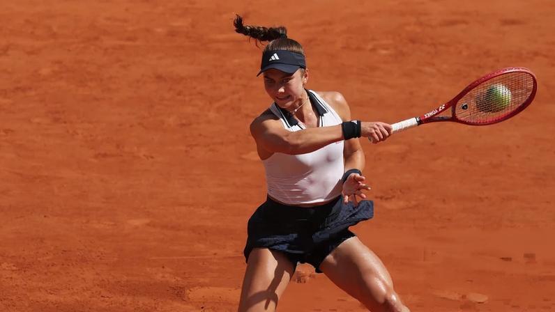Iva Jovic returns against Naomi Osaka.