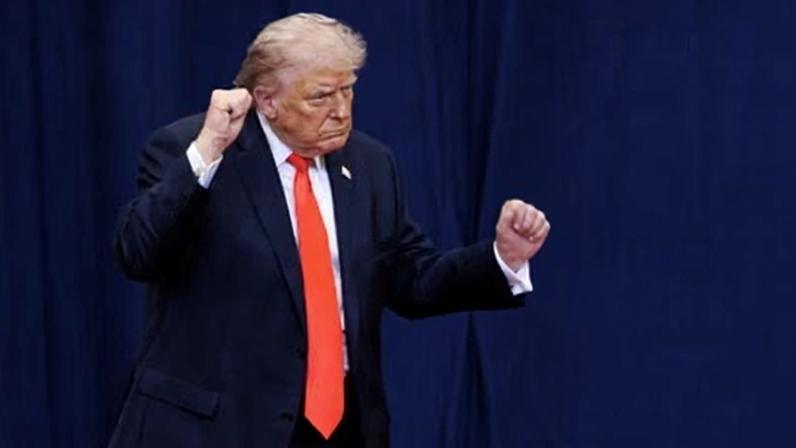 Donald Trump dances in front of the crowd in Florida before delivering his remarks.