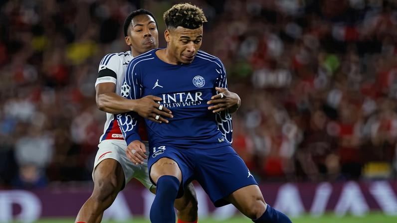 Arsenal’s Myles Lewis-Skelly gets to grips with PSG’s Désiré Doué in last season’s Champions League semi-final first leg, a battle that could be rejoined on Saturday.