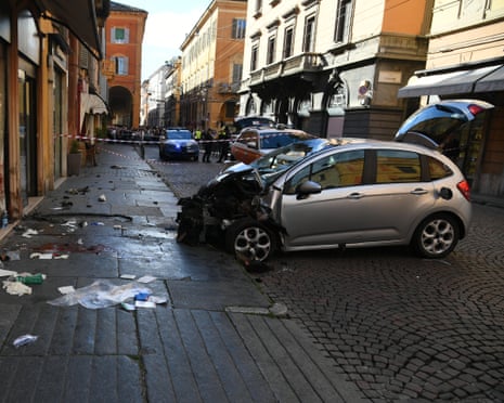 The car crashed into a shop window after hitting the pedestrians, according to local reports.