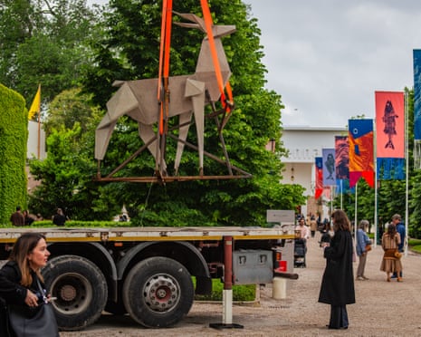 Visitors gather around The Origami Deer (2019) by Ukrainian artist Zhanna Kadyrova at Venice Biennale in Venice, Italy.