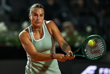 Aryna Sabalenka hits a return against Barbora Krejcikova