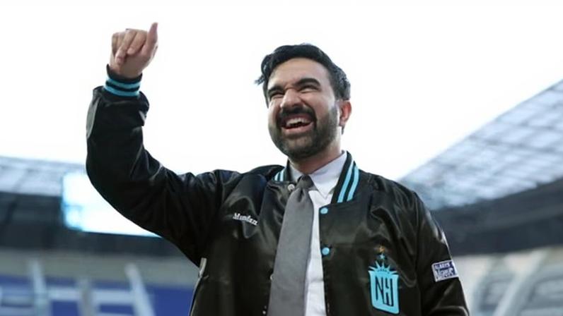 Good sport … Zohran Mamdani waves to fans at a football match in Harrison, New Jersey, 9 May.