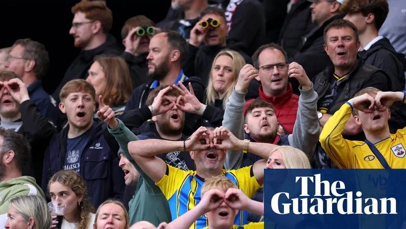 Southampton fans make light of the spying allegations during the first leg of their playoff semi-final with Middlesbrough.