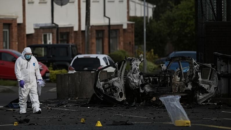 The attack took place on the night of the 25 April outside Dunmurry police station, south-west of Belfast.