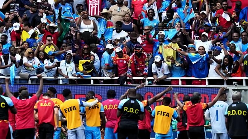 The Democratic Republic of the Congo team celebrate with fans after securing World Cup qualification in Guadalajara on 31 March.