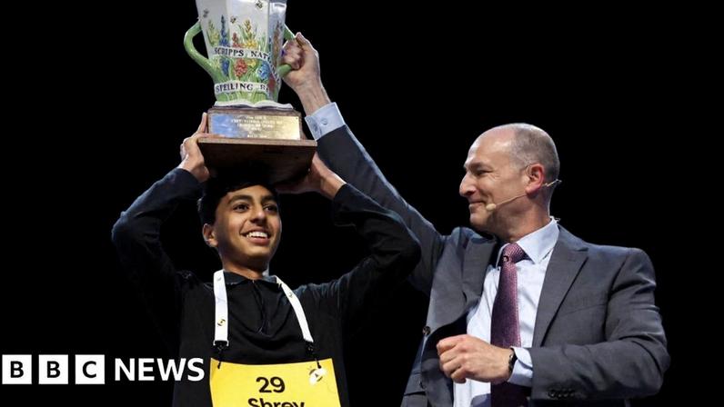 Shrey Parikh lifts the trophy after winning the annual Scripps National Spelling Bee.