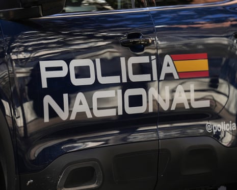 Plainclothes officers from Barcelona’s municipal police force apprehended the Canadian policemen after a woman called for help.