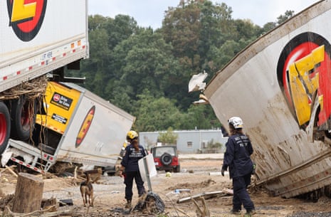 Members of Fema urban search and rescue taskforce search a flood damaged area in the aftermath of Hurricane Helene in Asheville, North Carolina, in 2024.