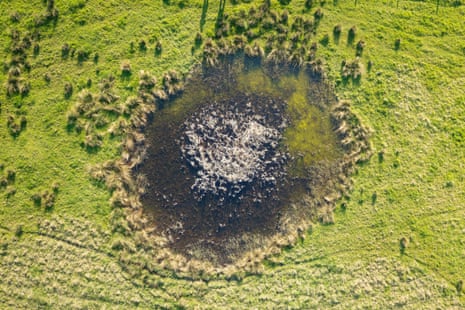 Aerial view of Bomb Crater Pond at Walthamstow Marshes formed by V-2 rocket strike