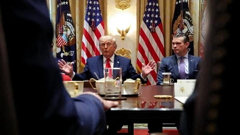 Donald Trump and secretary of defense Pete Hegseth during a cabinet meeting at the White House on Wednesday.