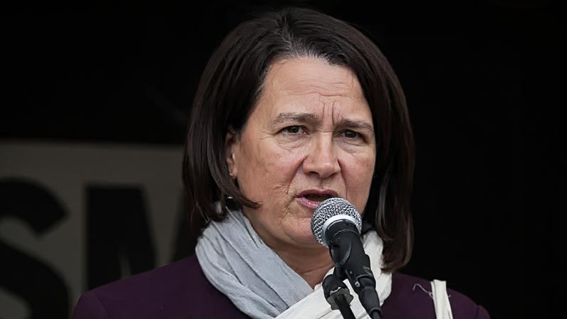 Getty Images Catherine West speaks into a microphone in 2017.