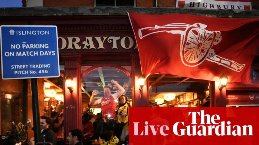 Arsenal fans celebrate at the Drayton Park Arms after the title was secured on Tuesday night.