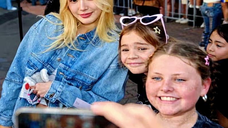 Yoonchae Jeung of girl group Katseye meets fans outside Luna Park in Sydney