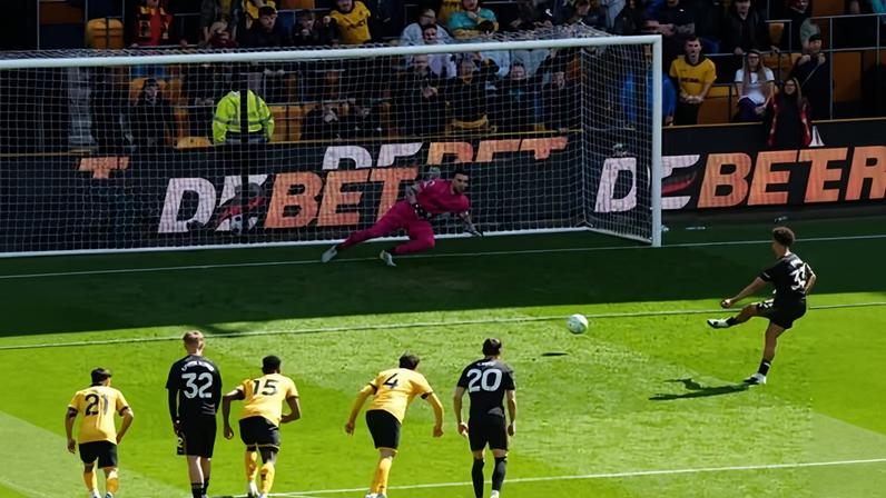 Antonee Robinson tucks his penalty past Wolves’ José Sá.