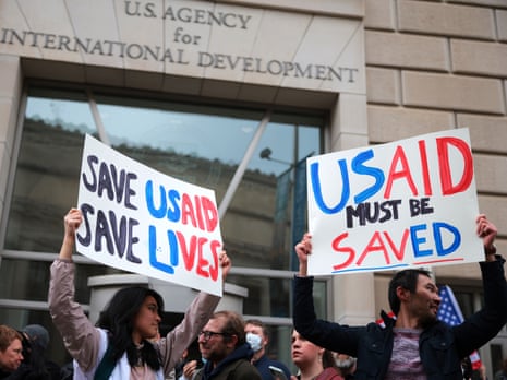A protest against Doge cuts, outside USAID headquarters in Washington DC on 3 February 2025.