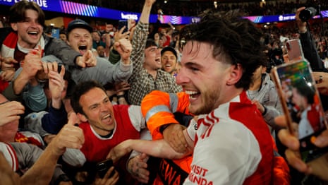 Leandro Trossard and Mikel Arteta celebrate Arsenal's semi-final victory
