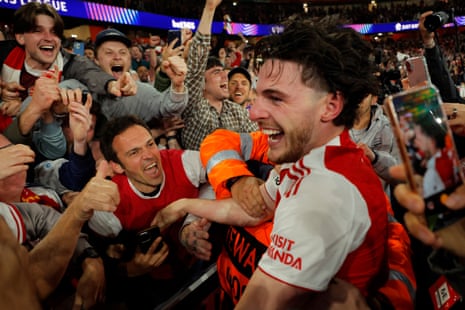 A euphoric Declan Rice joins supporters to revel in the moment.