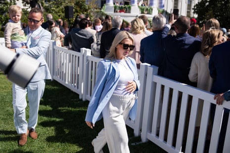 Karoline Leavitt, in the final stages of her second pregnancy, attends the White House Easter Egg Roll with her husband, Nicholas Riccio, and their son, Niko.