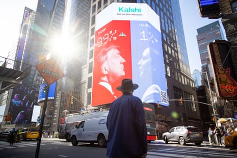 A billboard for Kalshi showing 2024 US presidential election odds in New York on 6 November 2024.
