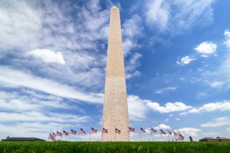Washington monument surrounded by flags