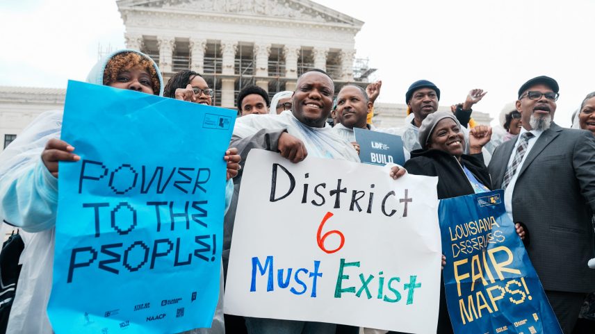 People rally outside the U.S. Supreme Court following arguments about Louisiana's congressional districts on March 24, 2025.