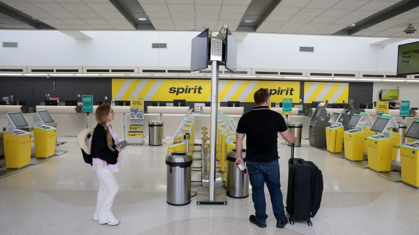 Rosmy Ramirez prepares to check in for her flight on Spirit Airlines to Texas before realizing it was canceled when the company shut down overnight at the Fort Lauderdale-Hollywood International Airport on May 02, 2026, in Fort Lauderdale, Florida.