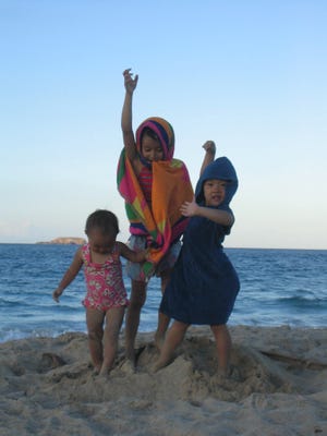 The Okamoto sisters remain a trio on trips, like when they were little.
