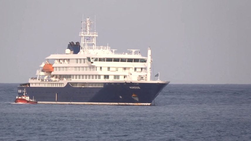 A boat beside cruise ship MV Hondius, hit by Hantavirus, anchored off Cape Verde port, on the day sick passengers were evacuated by boat from the cruise ship, in Praia Port, Cape Verde, in this screengrab obtained from a video, May 5, 2026.