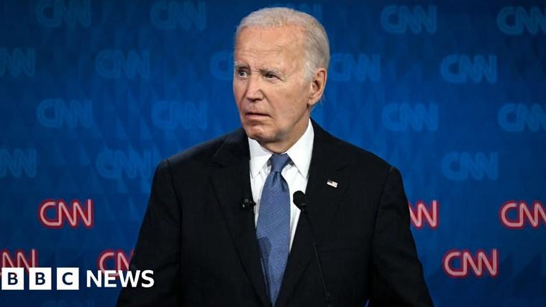 TOPSHOT - US President Joe Biden looks on as he participates in the first presidential debate of the 2024 elections with former US President and Republican presidential candidate Donald Trump at CNN's studios in Atlanta, Georgia, on June 27, 2024.