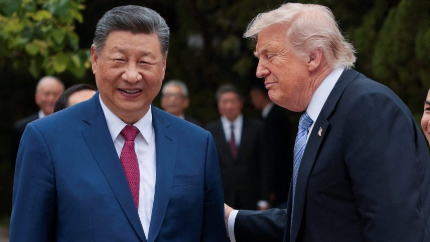 President Donald Trump speaks with Chinese President Xi Jinping while leaving after a visit to the Zhongnanhai Garden in Beijing, China, May 15, 2026.
