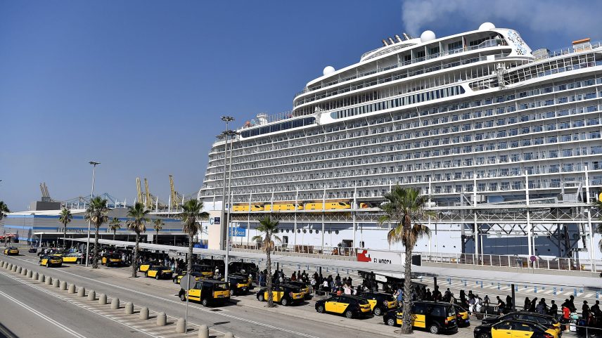 Cabs sit ready for passengers of Royal Caribbean's Wonder of the Seas at Barcelona's harbour, in this file photo from July 24, 2022.