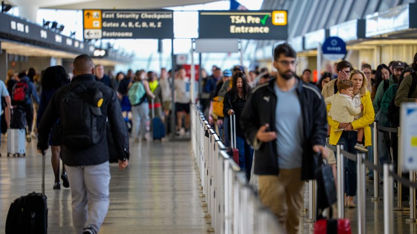 Travelers move through Washington Dulles International Airport on May 22, 2026 in Dulles, United States.