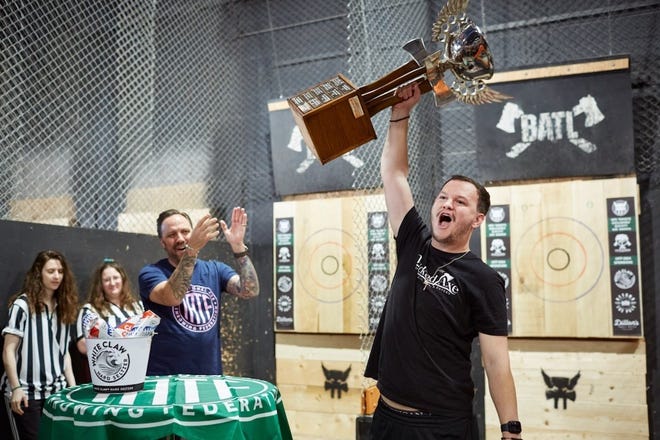 Austin Agosti, the 2024 international axe throwing champion, said the sport's tight-knit community and skill-based athleticism inspire players to compete for little to no pay.