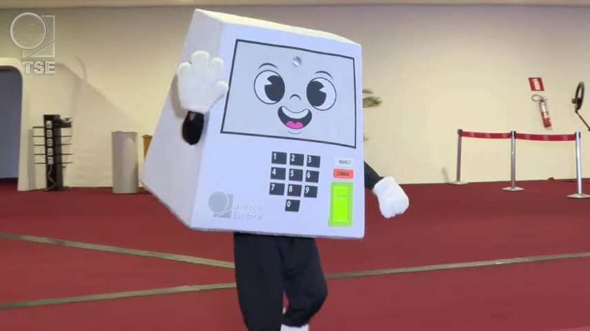 Descubra o significado da mascote Pilili, lançada pelo TSE para os 30 anos da urna eletrônica, e o seu papel nas eleições de 2026