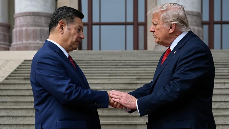 Xi Jinping e Donald Trump durante encontro na China - 14/05/2026 (KENNY HOLSTON / POOL/AFP)