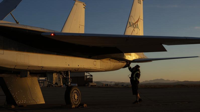 NASA crew chief Walt Kondracki checks an F-15 aircraft Tuesday, March 17, 2026, at NASA’s Armstrong Flight Research Center in Edwards, California. Ground crews, made of various roles, maintain the aircraft to be ready for each mission.