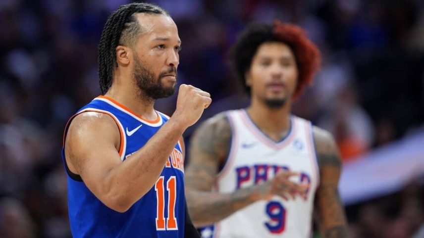 Jalen Brunson reacts as Kelly Oubre Jr. watches during the Knicks' 108-94 victory against the 76ers in Game 3. Brunson scored 33 points as New York took a 3-0 series lead.