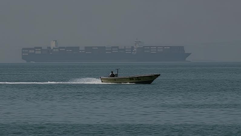 Embarcações no Estreito de Ormuz, Irã, 22 de maio de 2026 Majid Asgaripour/WANA via REUTERS