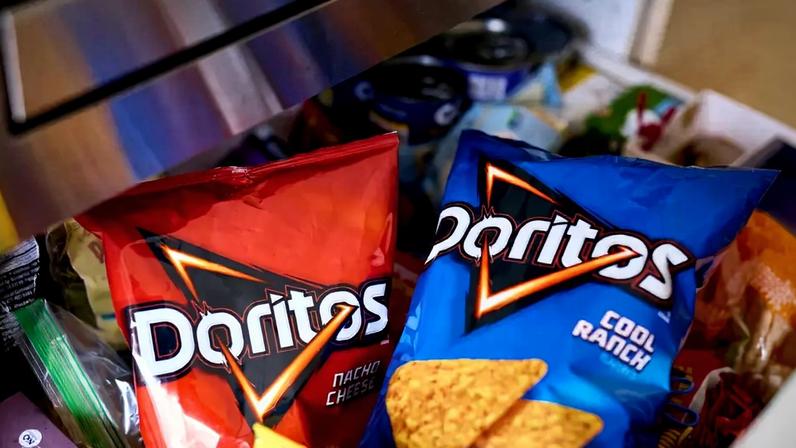 Salgadinhos da marca Doritos da PepsiCo em Nova York. Fotografia: Gabby Jones/Bloomberg