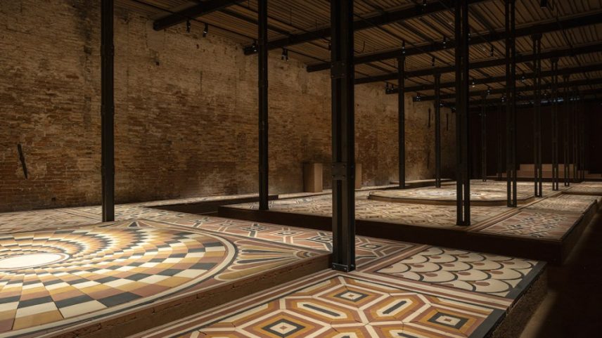 A floor covered in mosaics depicted birds and abstract patterning.