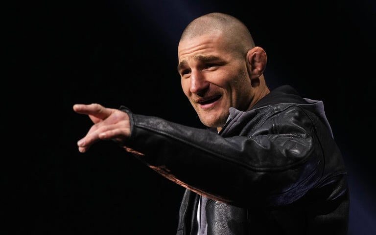 UFC middleweight champion Sean Strickland is seen on stage during the UFC 2024 seasonal press conference at MGM Grand Garden Arena on December 15, 2023 in Las Vegas, Nevada. (Photo by Cooper Neill/Zuffa LLC via Getty Images)