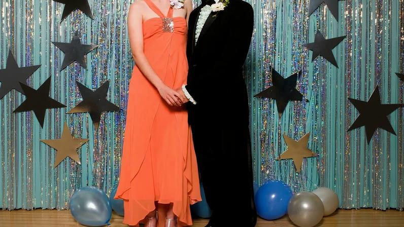 couple posing at prom
