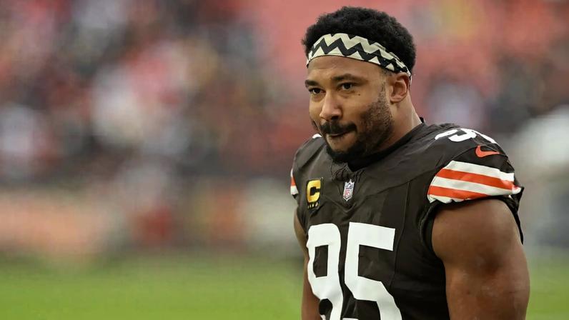 Myles Garrett stands on the field before a Cleveland Browns-Pittsburgh Steelers game in December 2025.