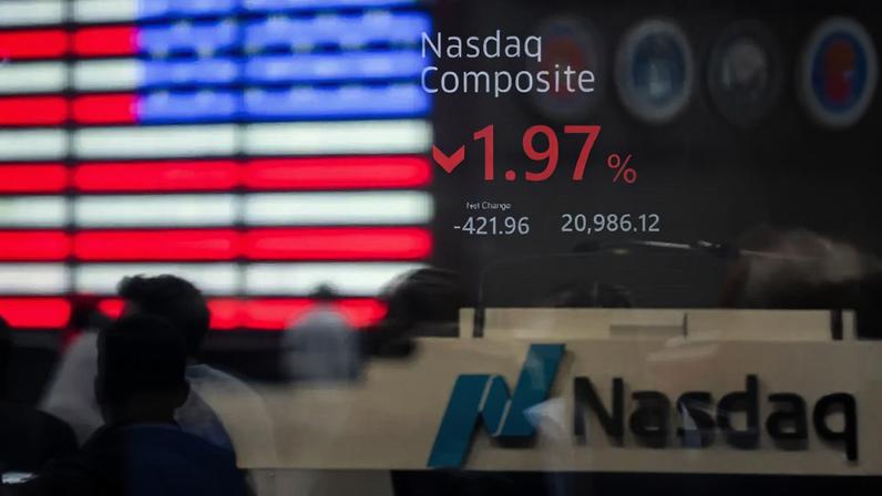 Informações de mercado no Nasdaq MarketSite, em Nova York, EUA, na sexta-feira, 27 de março de 2026