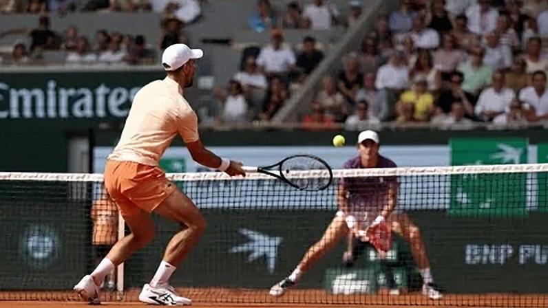 PARIS, FRANCE - MAY 29: Novak Djokovic of Serbia plays a volley at the net against Joao Fonseca of Brazil during their Men's Singles third round match on Day Six of the 2026 French Open at Roland Garros on May 29, 2026 in Paris, France. (Photo by Matthew Stockman/Getty Images)